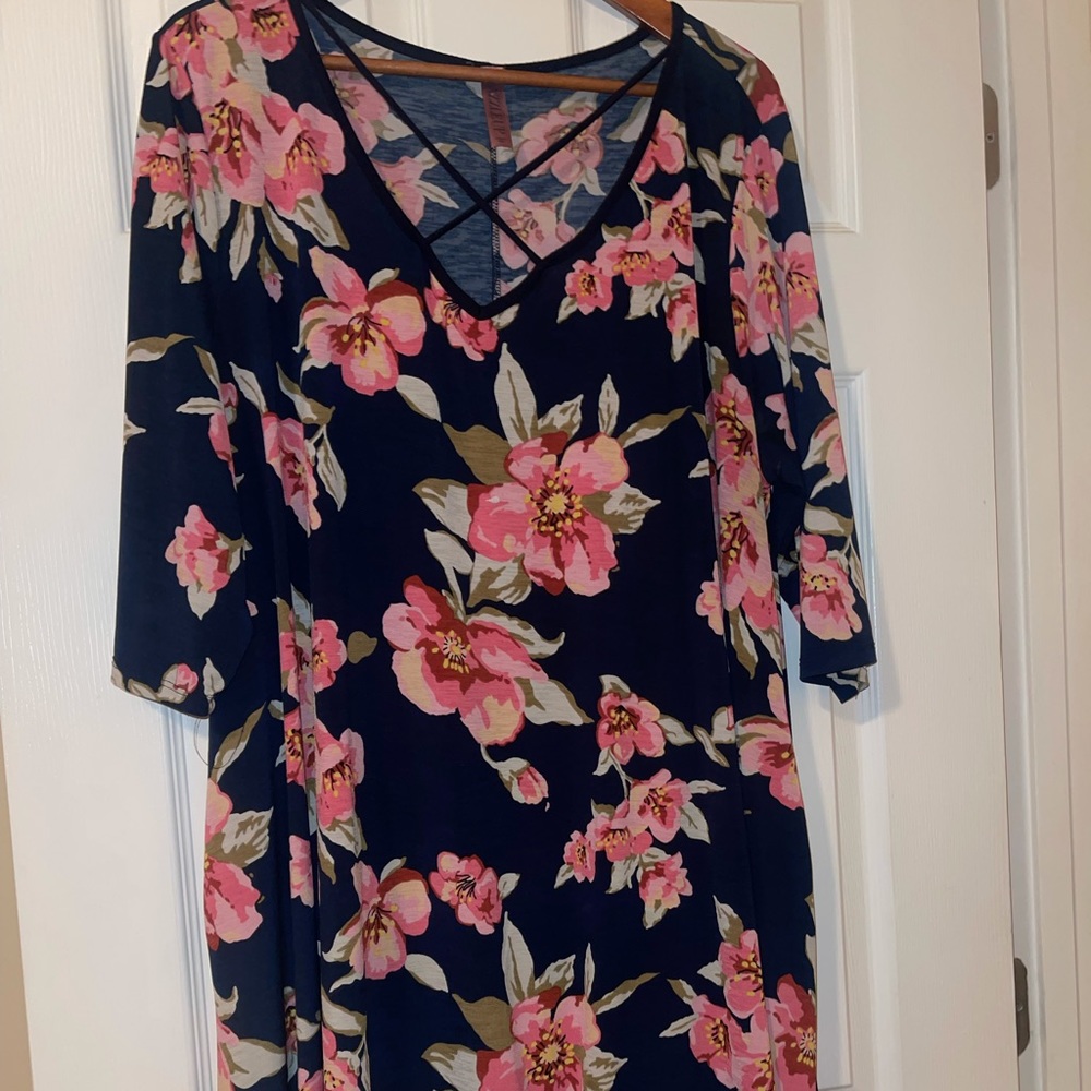 Navy blue pink floral shirt with crisscross at the top